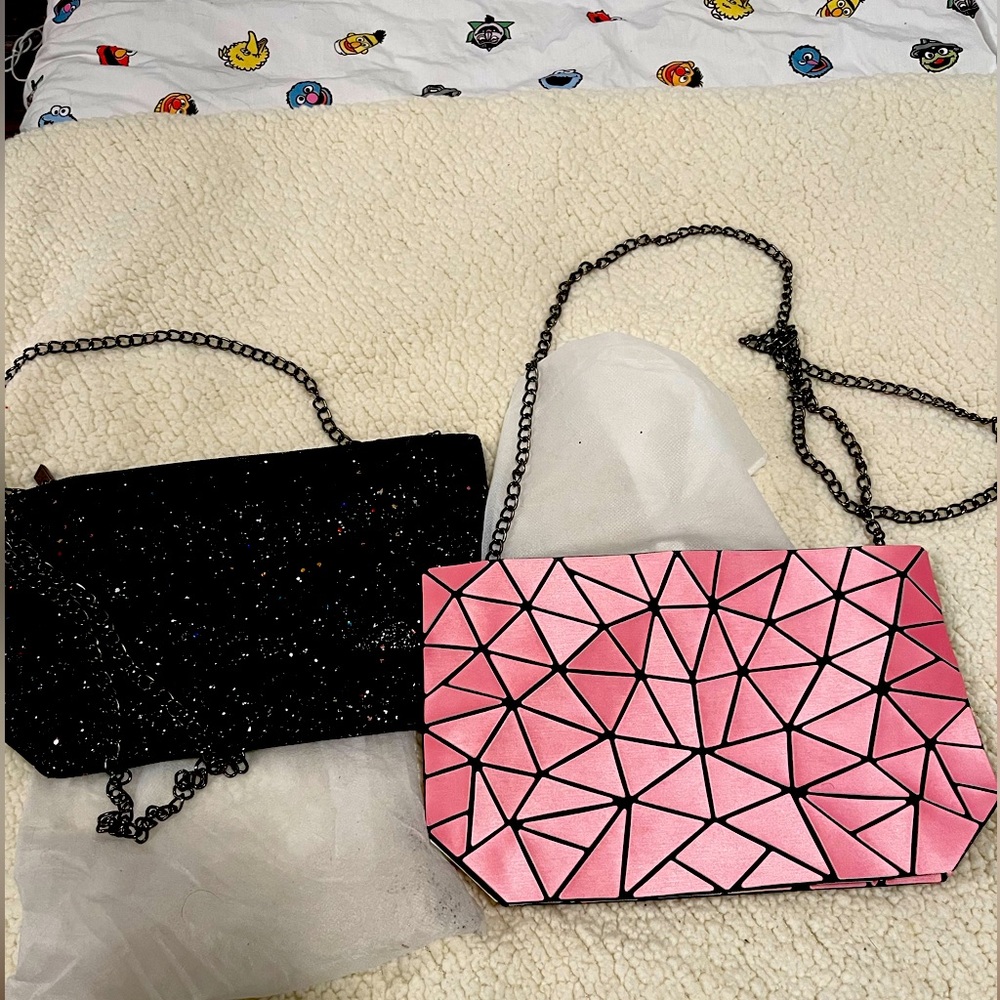 Two geometric crossbody bags (with dust covers)